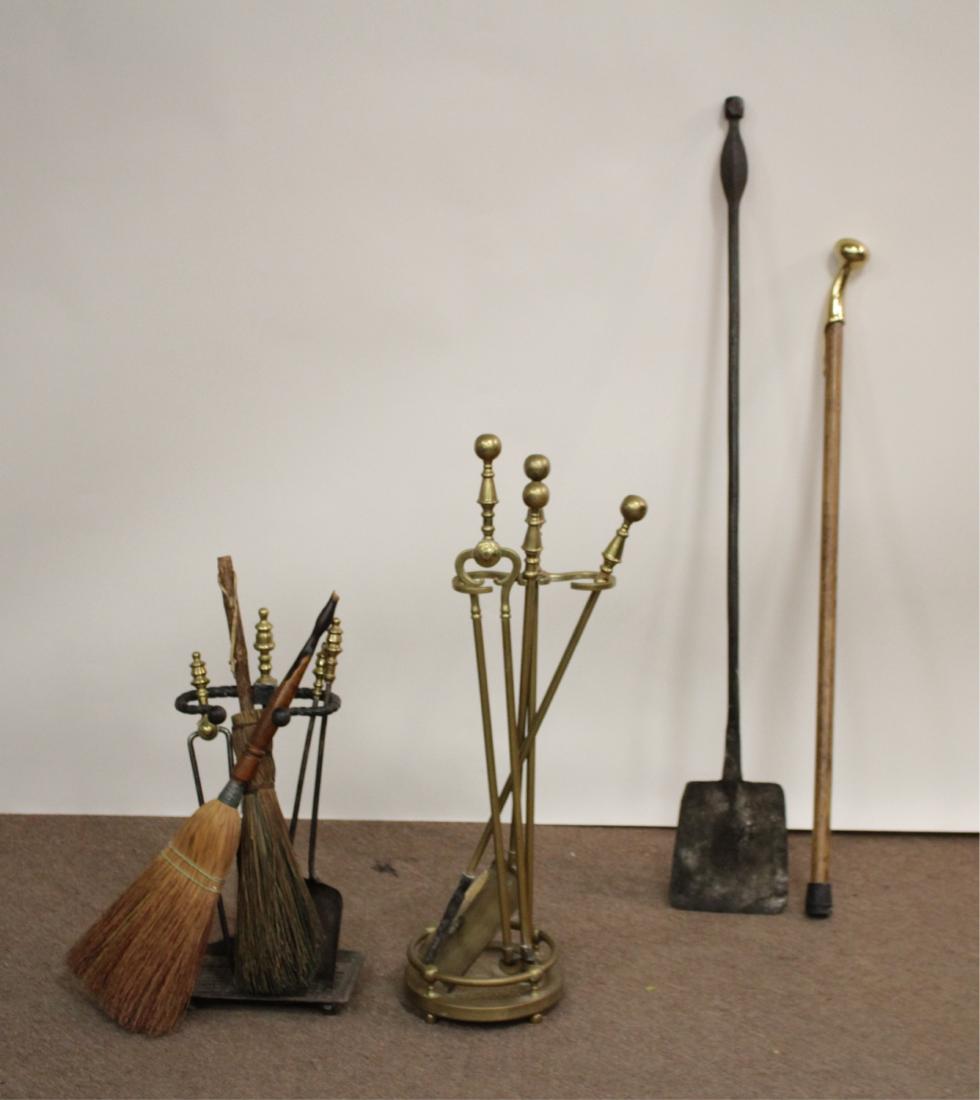 2 Sets Fire tools, Brass Headed Cane. Iron Spatula: 2 Sets Fire tools and Stands. One all brass, the other iron & brass. Each with a broom. Together with a long handles wrought iron spatula and brass headed oak cane. Cane; 37", Spatula; 45.5" Tool sets