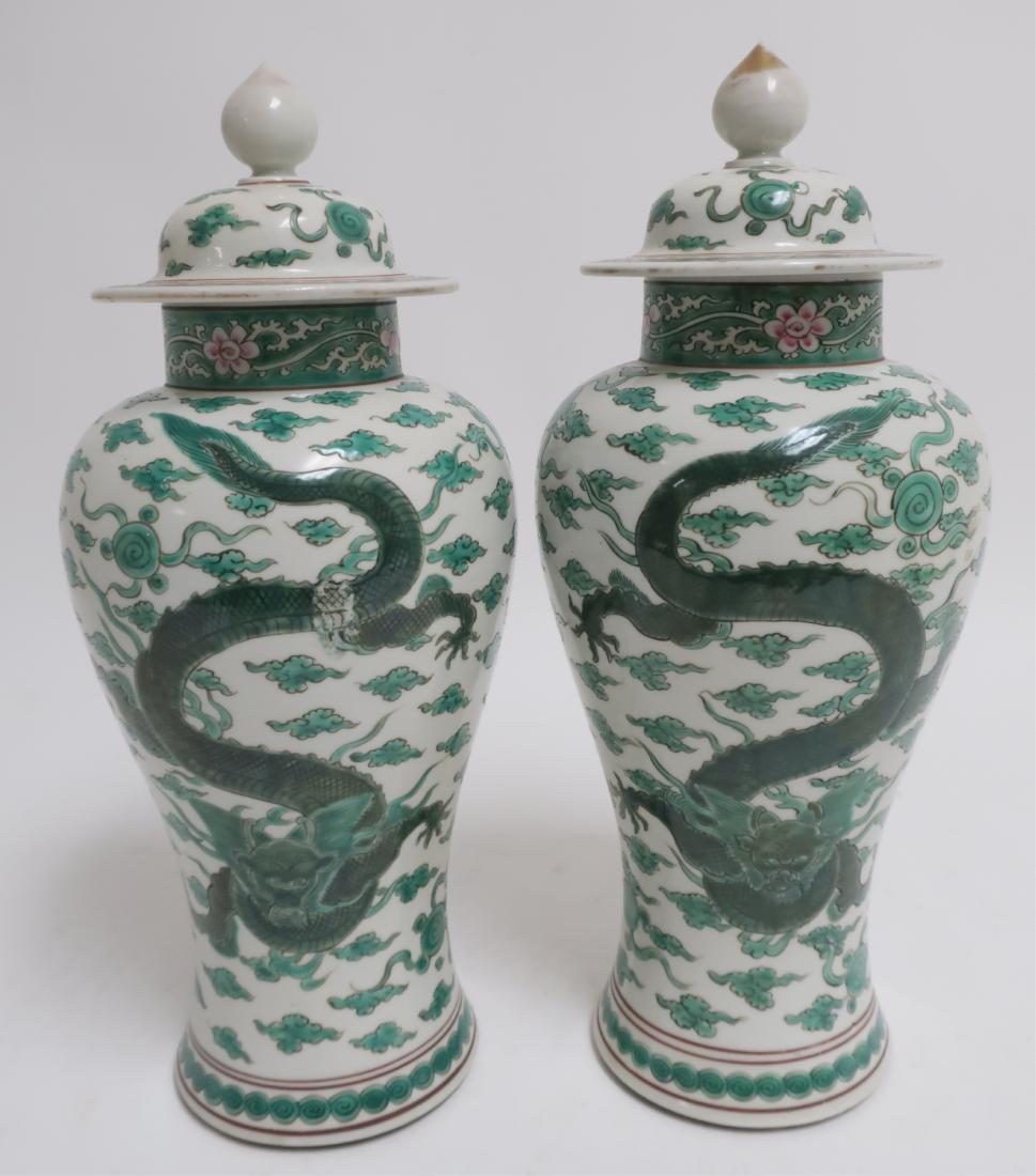 Pair of Chinese Porcelain covered Vases: Green dragons on a white ground Dimensions: 14.5 H x 5.5 diam (ROCO6665/2)(WT)
