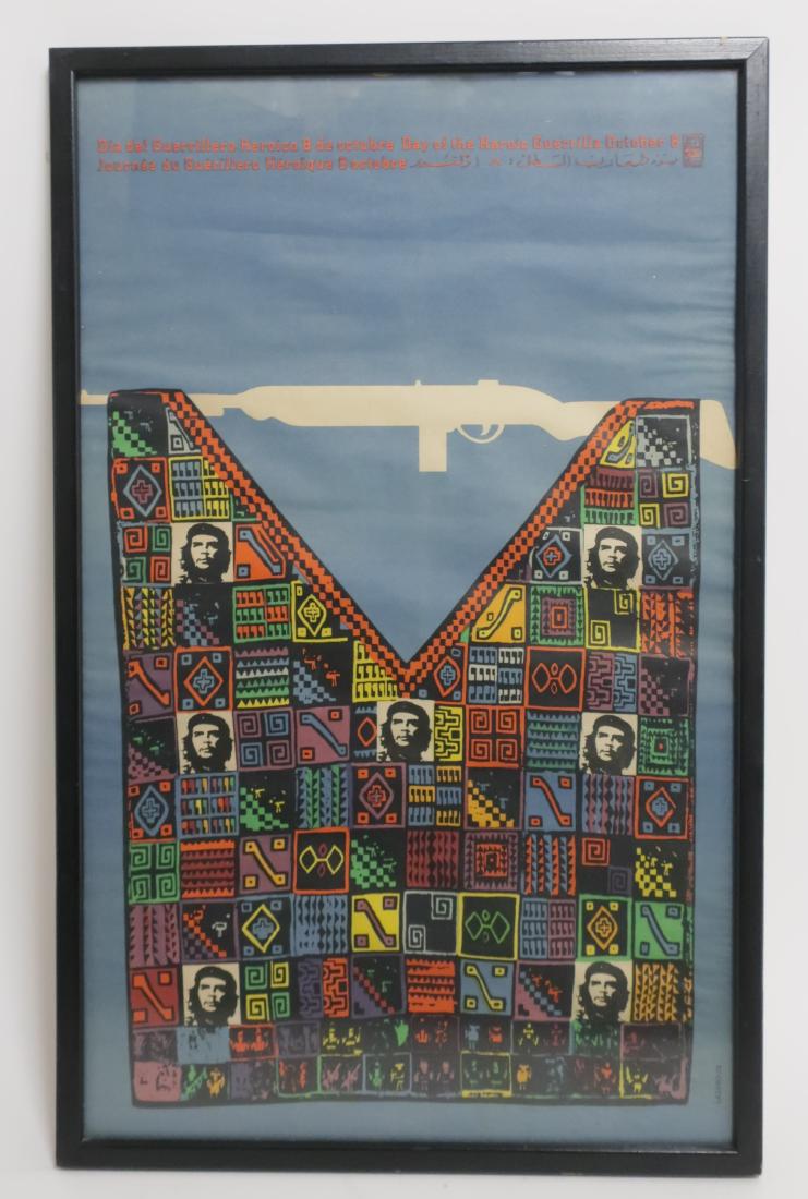 Vintage Propaganda Poster, Che Guevara: "Day of the Heroic Guerilla", published 1970, Lazaro-70 by OSPAAAL as insert for subscriber magazine. Three language title heading top of poster. Multicolor mosaic vest shaped quilt suspended from a w