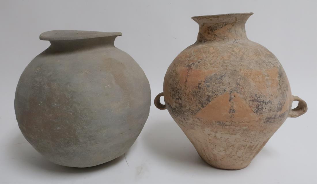 2 Large Pottery Jars: Plain Korean one. Painted one with geometric designs and ring handles. 13 h by 13 dia and 12 h by 10.5 dia LDI7131/2 WT