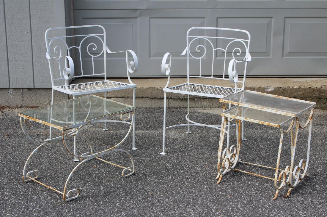Ptd. Metal Patio Furniture 2-Arm Chairs, 3 Tables: A mixed group. Pr of arm chairs, 2 stacking tables, the largest stacking one has a plexiglass top, other with a glass top. Along with 1 rectangular table with glass top. Chairs; 31.5 h by 18 w by 18 d