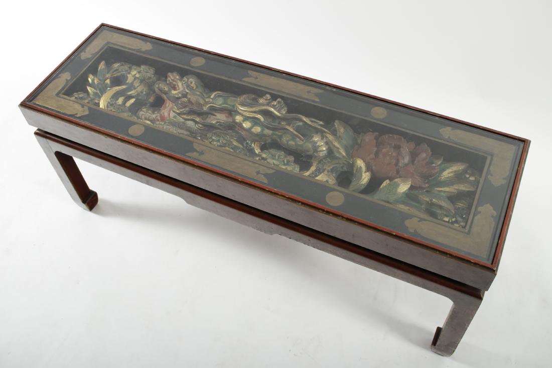 Chinese Coffee Table: With high relief carved colorful dragon and lotus flower under glass. 18" H x 44" L x 13 1/2" D QGMAL35-142 WT