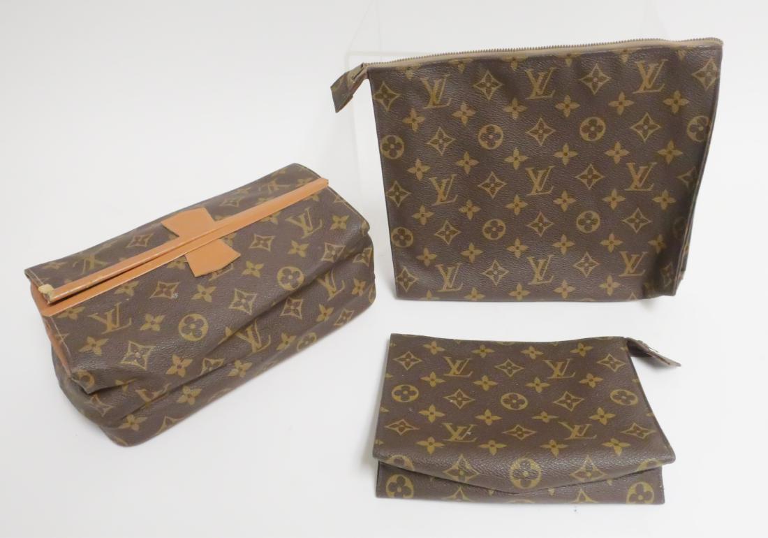 Vintage Louis Vuitton Toiletry Pouches/Bag: Vintage Louis Vuitton Luggage Accessories includes, zipper closure Pouches with Saks Fifth Avenue retail logo, pop up toiletry bag unmarked Bag 3 1/2"H x 9 1/2"W x 5"D, Folios 6 x 7 and 8 x 10 LBRI113