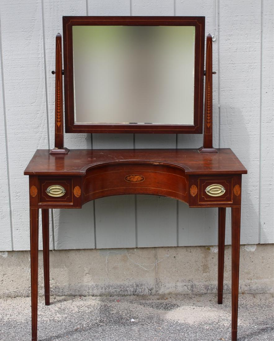 Federal Style Mahogany Mirror Back Dressing Table: 20C with satinwood shells, bellflowers, string inlay. Half circle inset form to table.Adjustable mirror. Brass pulls. overall 55"H x36W x 18.5 deep mirror 21 x 25 table 31H ROCO7584 JP