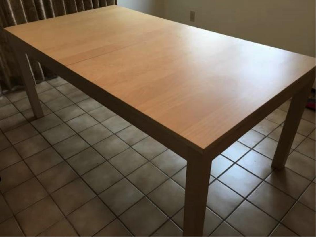 IKEA BJURSTA extension dining/work birch table: IKEA BJURSTA extension dining/work table, natural birch, two leaves store underneath, fully assembled with legs currently unbolted for storage and transportation, all original hardware, IKEA wrench, a