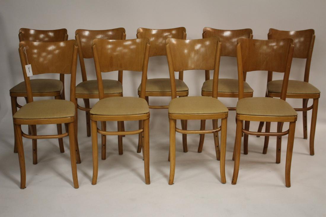 9 Thonet Bros. Wood Side Chairs, c.1950: Set of Nine Thonet Bros., Inc. Bent Wood Side Chairs, c.1950, all labeled to underside, stamped Mundus, Made in Poland, original upholstery 33"H x 14 1/2"W x 18"D MTZU6381/9 MM