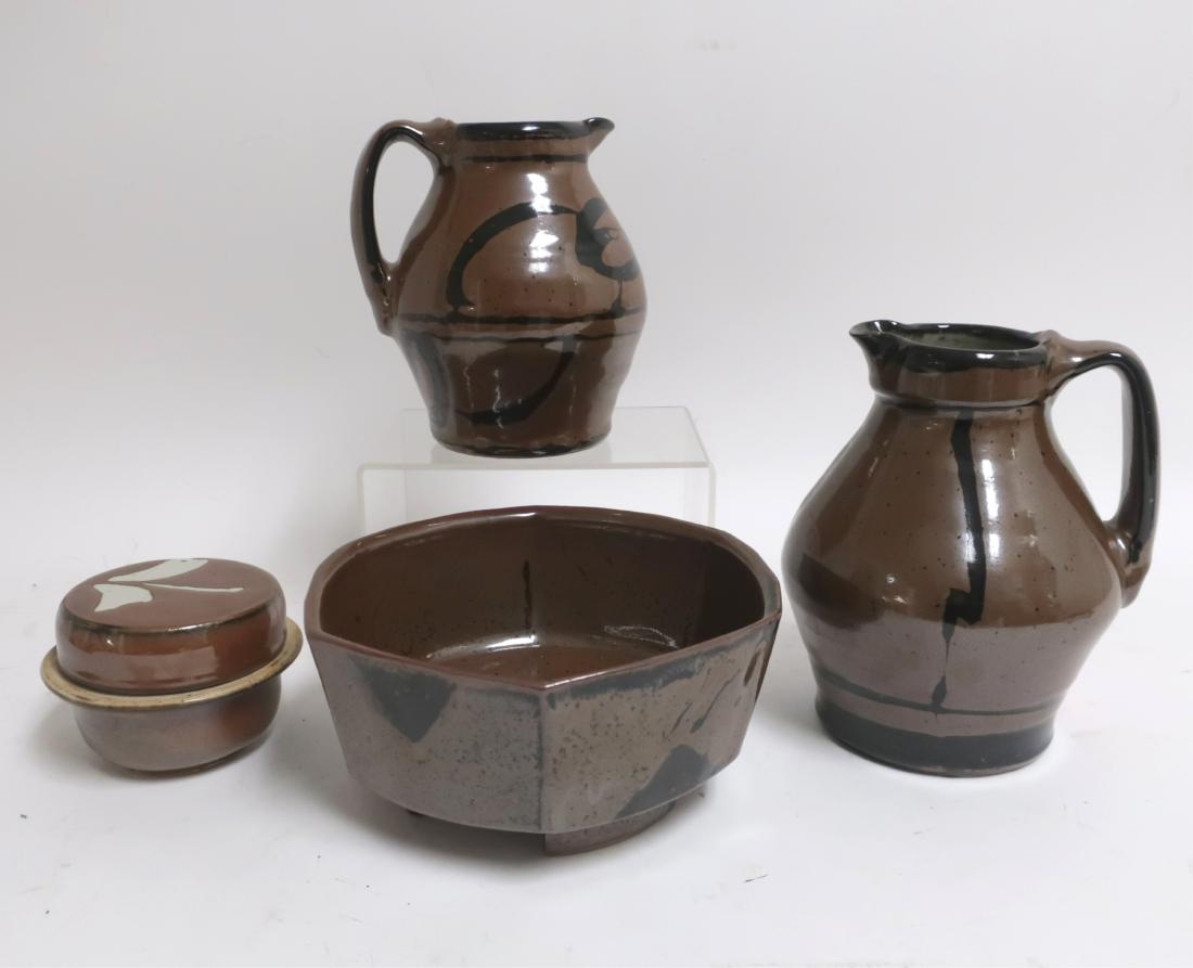 Studio Art Pottery; Goldberg, Oestreich: Two pitchers, high gloss, smooth glaze; hexagonal casserole/bowl similar colors, glaze; lidded vessel/jar with contrasting white decoration glaze. All signed. Bowl 9.5"dia. x 4.5H Pitchers 7.5 and 9H 
