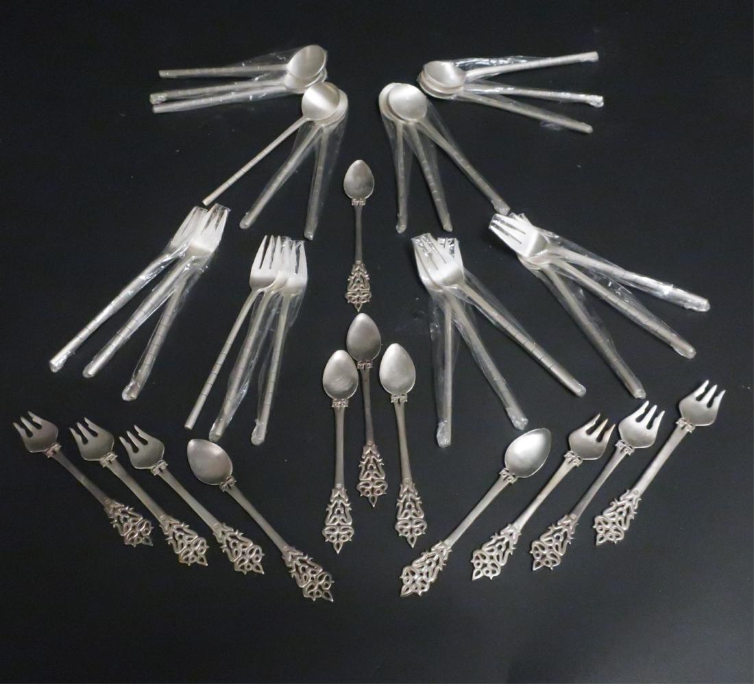 Korean Silver .99 Standard: 12 forks & 12 spoons of small size, "bamboo" design handle. 17 ozt. Plus a set of Korean silver, 6-forks and 6-spoons of small size with pierced handles. 8 ozt. 6" l and 4.75" to 5" long (BSYI8605/36)