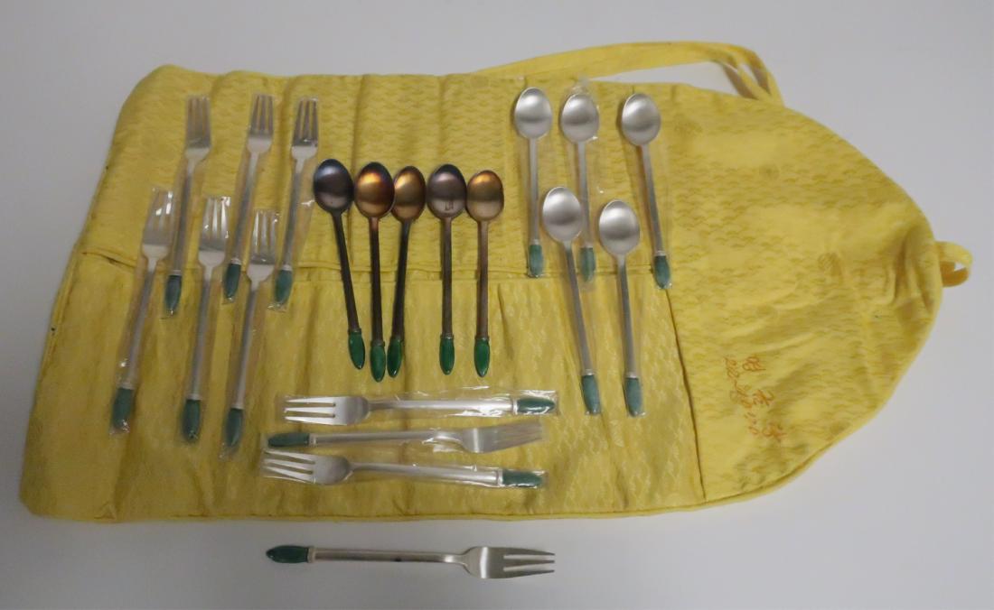 Korean Silver .99 Standard, Enamel Handles: Koren silver set .99 standard of small spoons and forks. Green enamel on end of handles. 10 of each. 9 ozt. 5" Long (BSI8606/20)(wt)