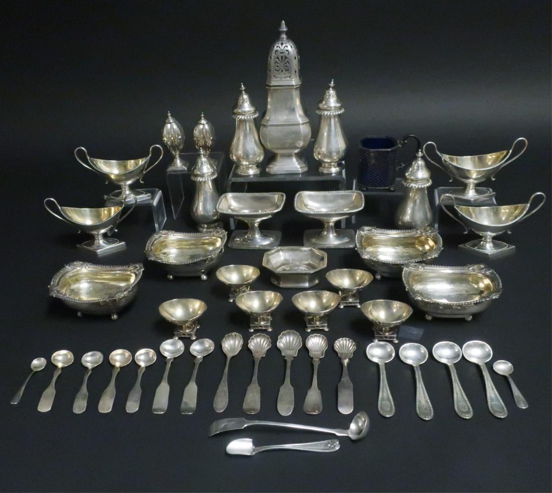 Group of Sterling & Coin Silver Salts & Peppers: Set of 4 George III open salts, London 1895. Four Tiffany & Co, marked 1895. Clichton Caster, 1917. Six Gorham tiny pedestal salts, etc. Monograms. 65 ozt. Approximately 19 spoons, 26 casters, salts e