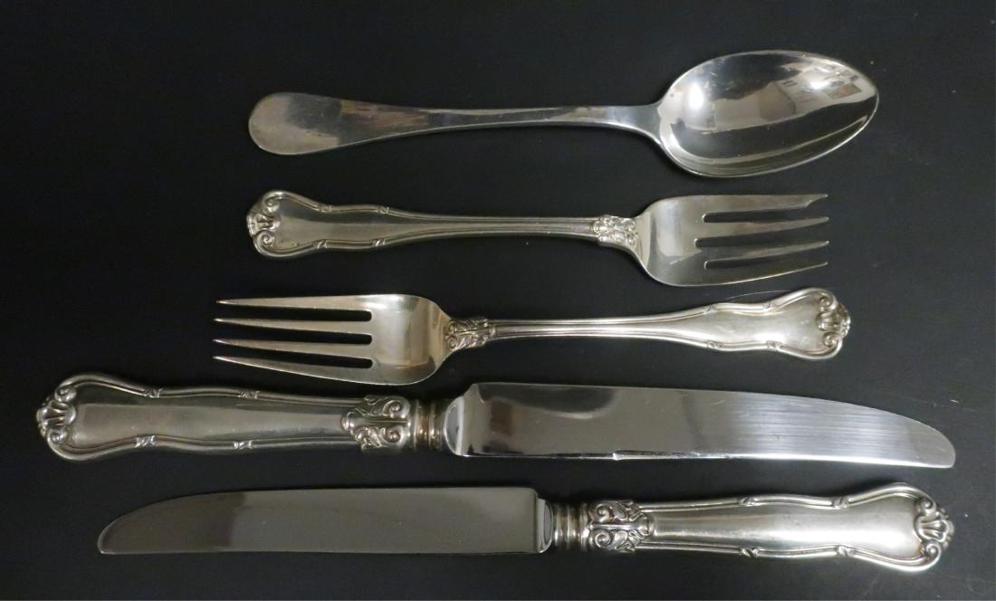 Tiffany & Co Sterling Silver Flatware: 2 patterns. 16 dessert/soup in the King William pattern. 5 lunch forks, 5 salad forks, 12 dinner knives in the Provence pattern. Weighable silver: 48 ozt. Excluding knives. Dinner knives 9" long Prope