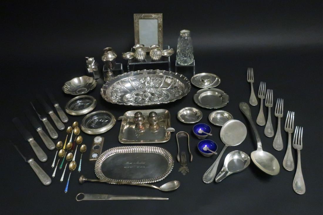 Mixed Silver: Tiffany Cartier .925 .916 .800: Cartier birth picture frame, Tiffany lighter, Tiffany desk compass, magnifier, ruler; larger servers, 6 pieces .916 knives and forks, repoussed bowl etc. 65 troy ounces weighable excluding any weighte