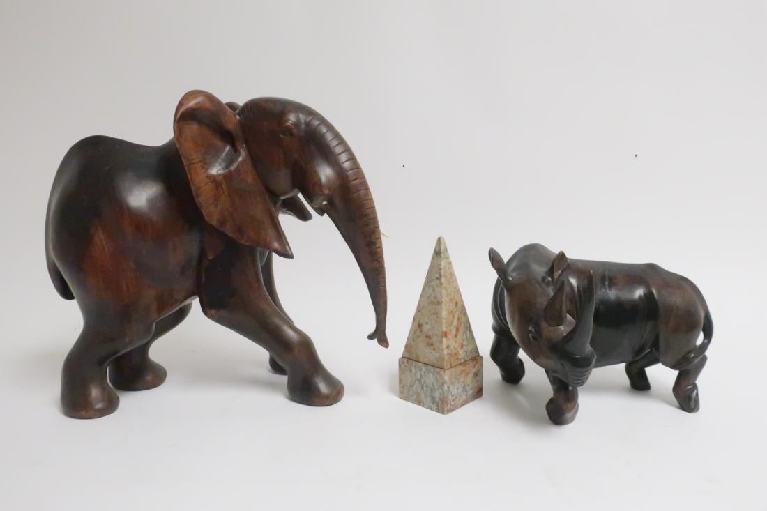 African Ebony Carved Elephant and Rhinoceros: Large African Ebony Carved Elephant and Rhinoceros along with Stone Obelisk Rhino 8 x 12 x 1 and Elephant 17 x 20 x 10 (ESYK8532/2)(MM)