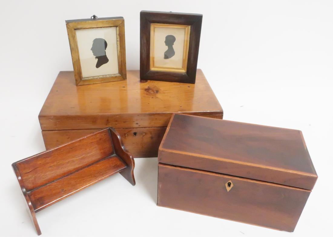 English and American Wooden Objects: English and American Wooden Objects, 19th-20th C., includes a tea caddy, miniature church pew, 2 framed silhouettes and a pine hinged writing desk 7 x 5 1/2 picture to desk 5 x 15 x 9 (JSTR8556/5)(MM)