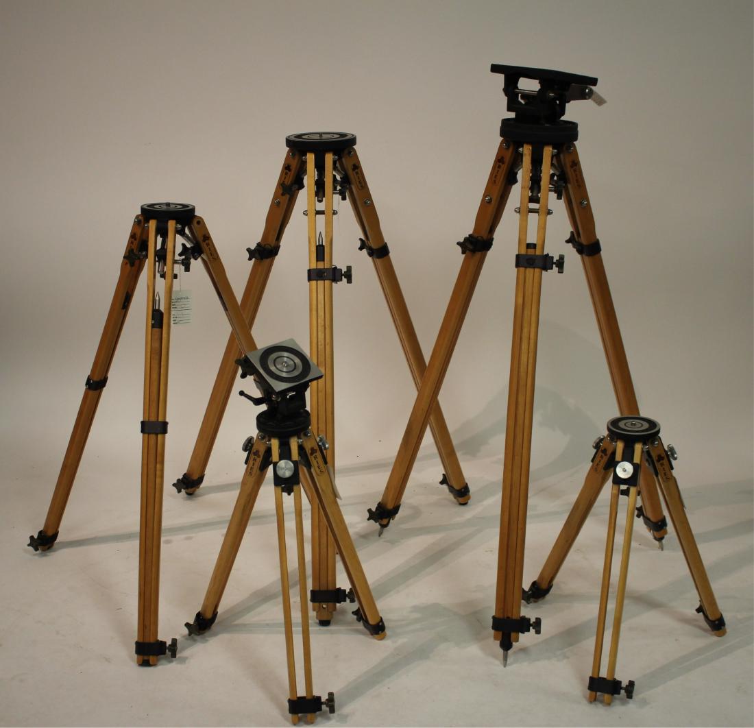 Wooden Field Photography Tripods and Heads: 5 wooden Ries tripods as follows: 2-Model A Deluxe Ries tripods, 3-Ries Jr tripods (2 with soft bag case), 1-Ries Model A207 photoplane tilt head, 1 Ries model 1607 tilt head Lengths 24" and 42", unex
