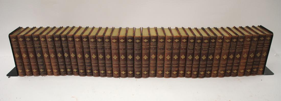 Leather Bound Works of Dickens Set: The centenary edition of The Works of Dickens in 36 volumes. Scribners NY 1911, top edges gilt. 6" x 9" Property from the Estate of Rosalie Coe Weir (ROCO7194/36)(GO)