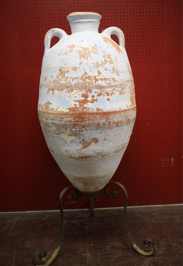 Massive Amphora on Scrolled Iron Stand: Massive Amphora on Scrolled Iron Stand 50 x 25, stand 20 x 32 (JDRU8552/2)(MM)