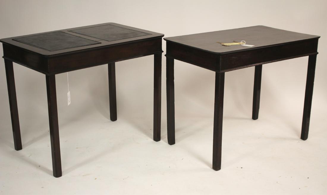 Near Pair of Mahogany Rectangular Tables: One is George III, 18th century and the other is 20th century. 2 panel leather top. Antique: 28.5 H x 35 L x 21.5 D. Other is slightly larger Property from the Estate of Rosalie Coe Weir (ROCO8102/2)(