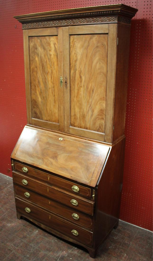 Federal Mahogany Bureau Bookcase, Early 19th C.: 2 part, blind fret carved and dentil cornice. Fitted interior. Numerous names and addresses written in pencil on the bottom board of the proper left interior long drawer. 84 H x 43 W x 22 D Property f