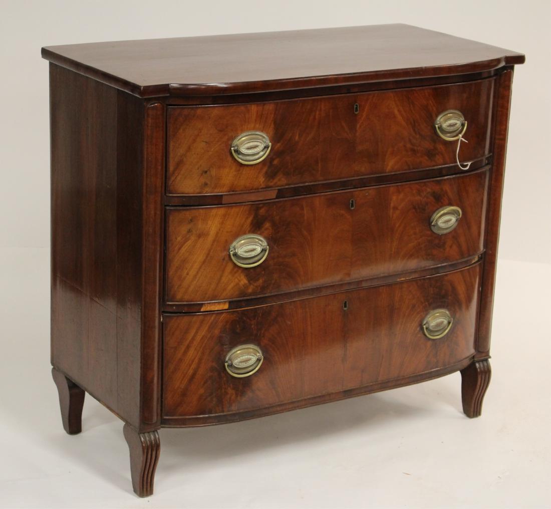 Mahogany Bowfront Chest of Drawers, 19th C.: 3 drawers w/ locks; replaced brasses Property from the Estate of Rosalie Coe Weir (ROCO8281)(JP)