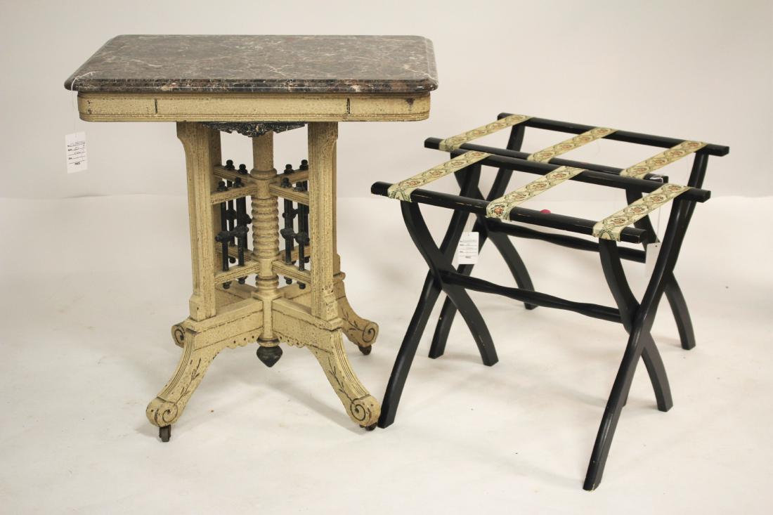 Eastlake Victorian Table & luggage stands: Eastlake Victorian Table Base with later marble top, base with off white crackled finish on casters; two contemporary wooden folding luggage stands with floral woven stretchers 28"H x 30"W X 20"d (ESY