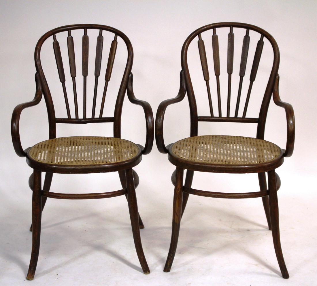 Pr. of Oak Bentwood and Caned Arm Chairs: Pr. of Oak Hoop Back Bentwood and Caned Arm Chairs 36"H x 21" W x 24"D (ESYK8427/2)(MM)