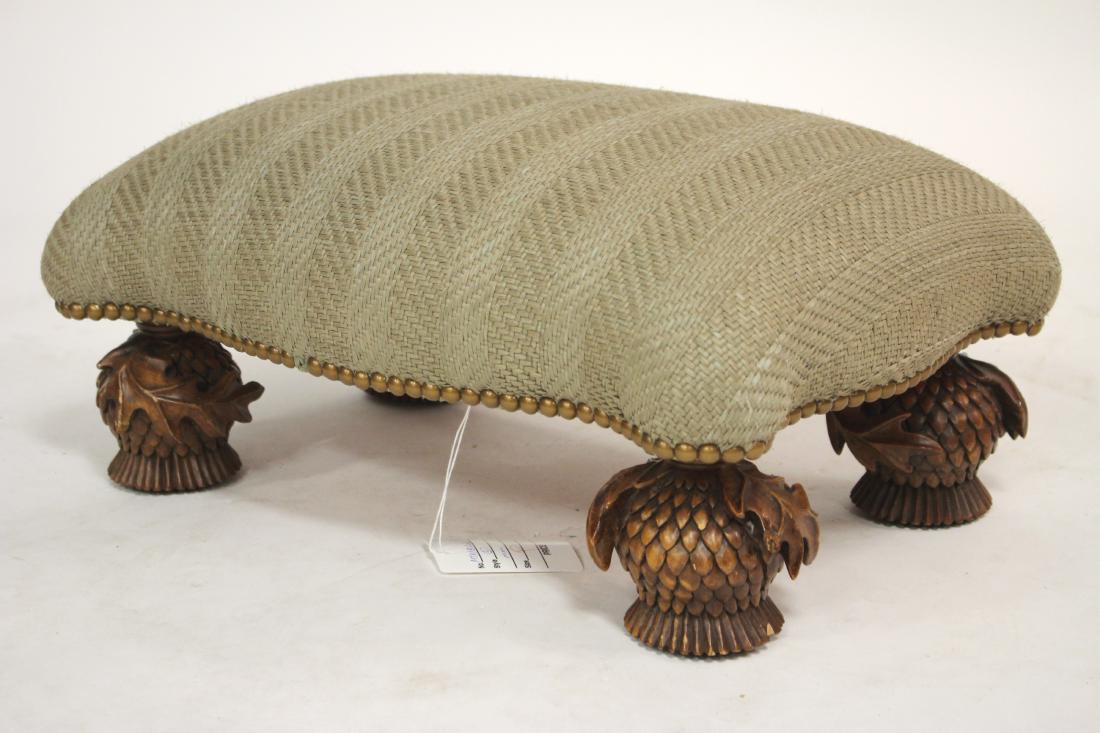 Mackenzie Childs, Ltd. Footstool, c. 1983: Mackenzie-Childs, Ltd. Footstool, c. 1983, with grass cloth and nail head upholstery, thistle carved feet 9"H x 19"W x 13"D (MTKI8266)(MM)