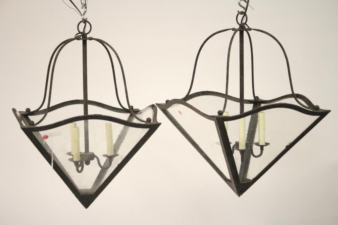 Pr. Dennis & Leen Iron/Glass Paul Revere Lanterns: Pair of Dennis & Leen 20th C., "Paul Revere" Wrought Iron Hanging Lanterns in Rusty Brown Antique Color with seeded glass, 3 light 20 x 20 x 28"H (ESYK8388/2)(MM)