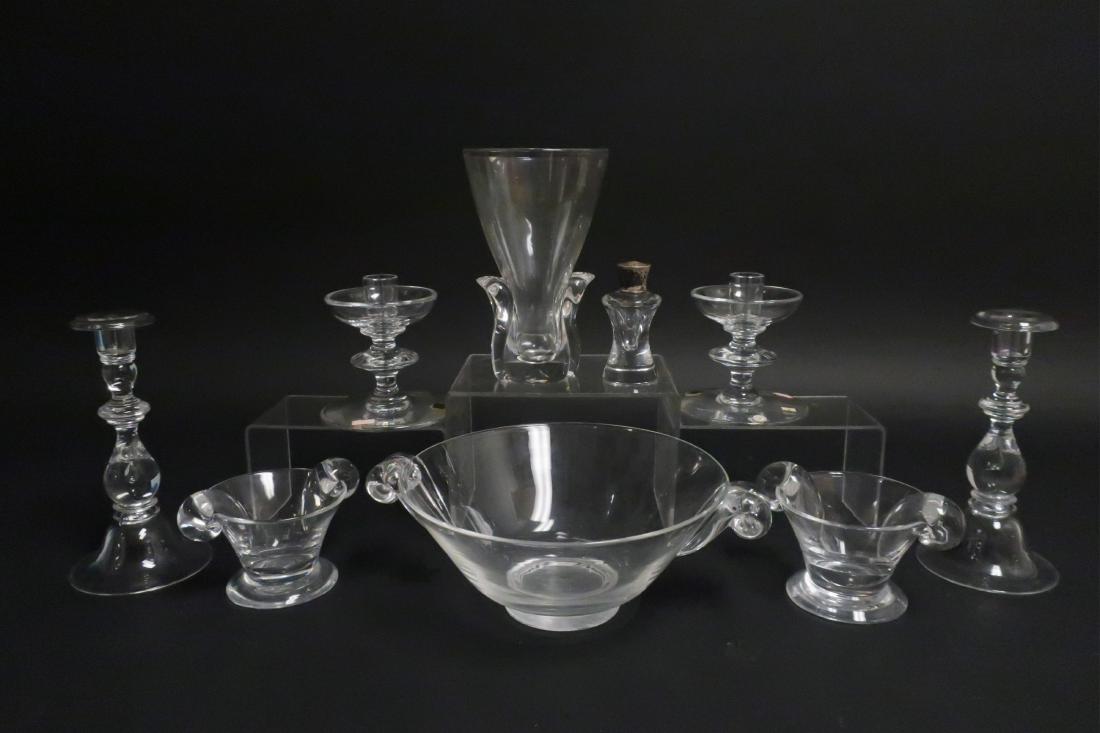 Steuben, Val St. Lambert Glass: (3) Steuben graduated sizes handled bowls, vase, salt shaker, pr. candlesticks; pr. Val St. Lambert candlesticks. bowl 12"dia. x 4.25H 4H small bowls vase 8H Steuben csticks 8.75H Property from the Es