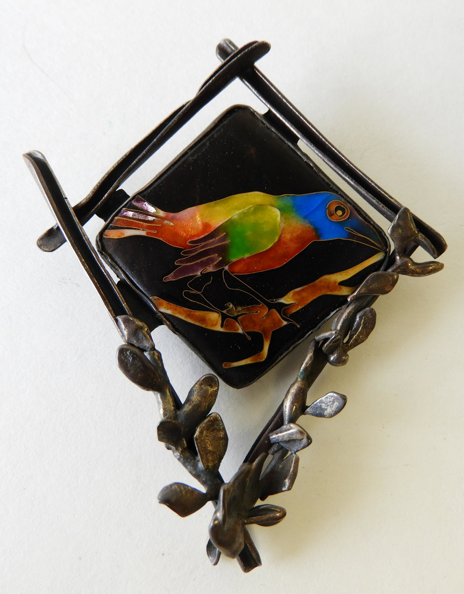 Painted Bunting Enamel Brooch: Sterling silver and 24k yellow gold brooch with cloisonne enamel painted bunting bird perch on brach by Kristin Holeman. 3" long. Property from the estate of Rosalie Coe Weir