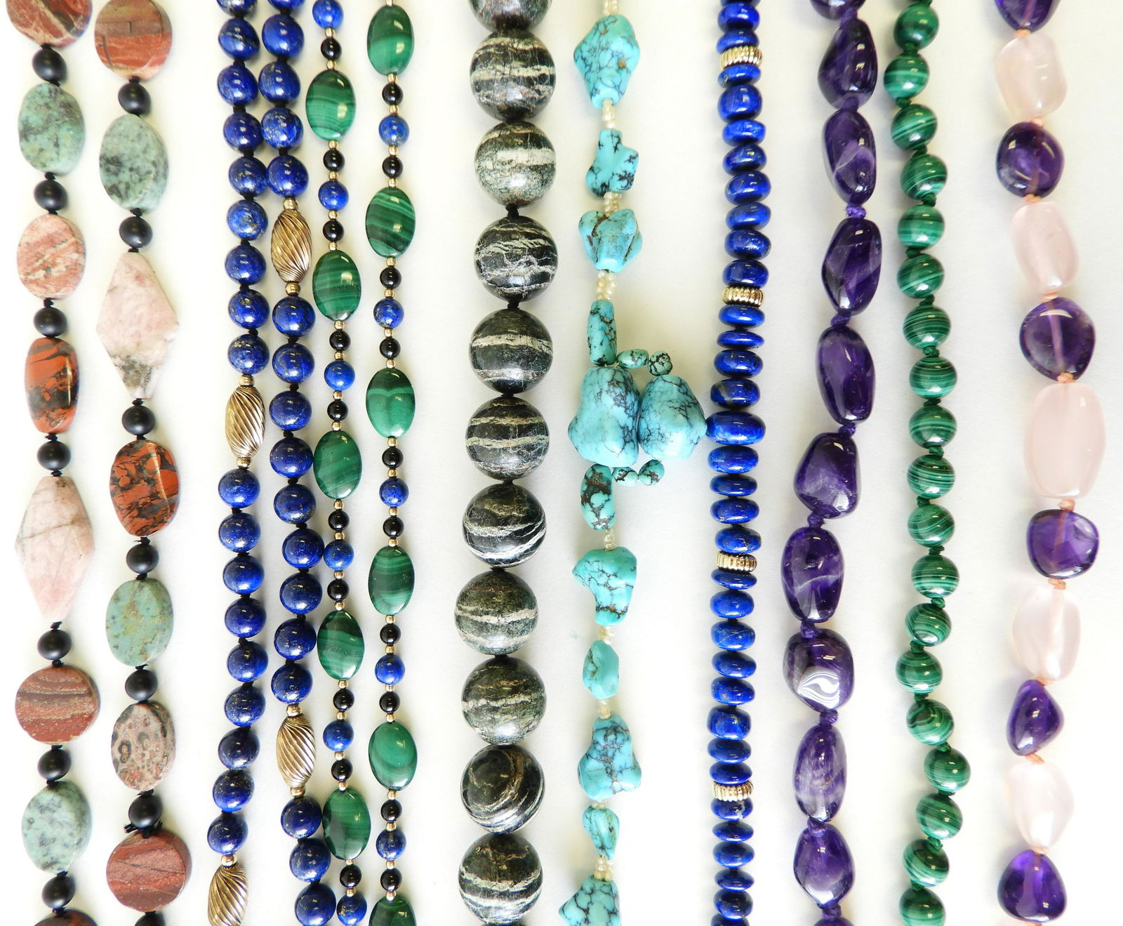 Group of Hardstone Necklaces: Includes: 18" lapis necklace with Chinese symbol clasp, 34" lap necklace, 20" malachite necklace with 14k gold clasp, 32" lapis & malachite necklace, 16" amethyst necklace, 18" amethyst & rose quartz