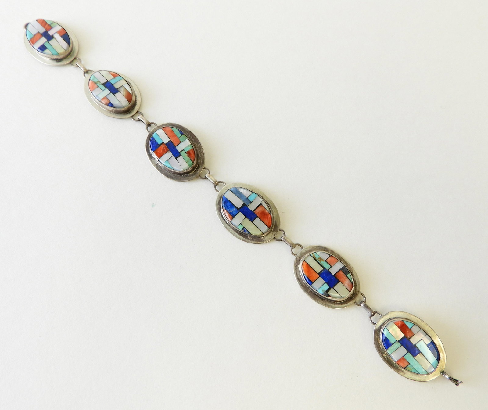 Hardstone Bracelet - Signed JLR: 6 links with various inlaid hardstone set in sterling silver. 9" long Property from the estate of Rosalie Coe Weir