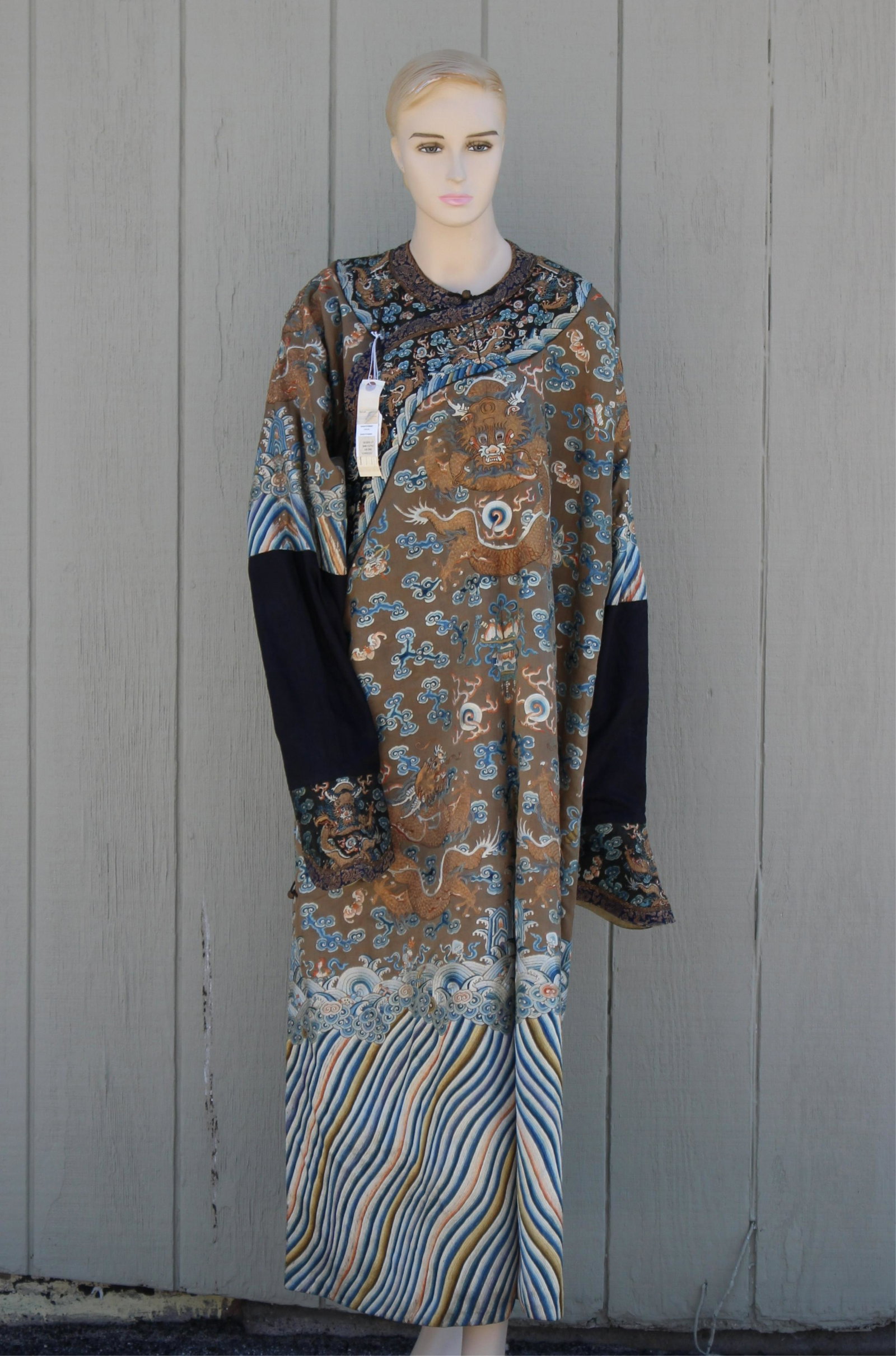 19th c. Mangpao Highly Embellished 9 Dragon Robe: A 19th c. Chinese Mangpao Heavily Embellished Silk Nine Dragon Robe, couched gold thread and satin stitch on front and back, the front with three five-clawed dragons facing flaming pearls among ruyi c
