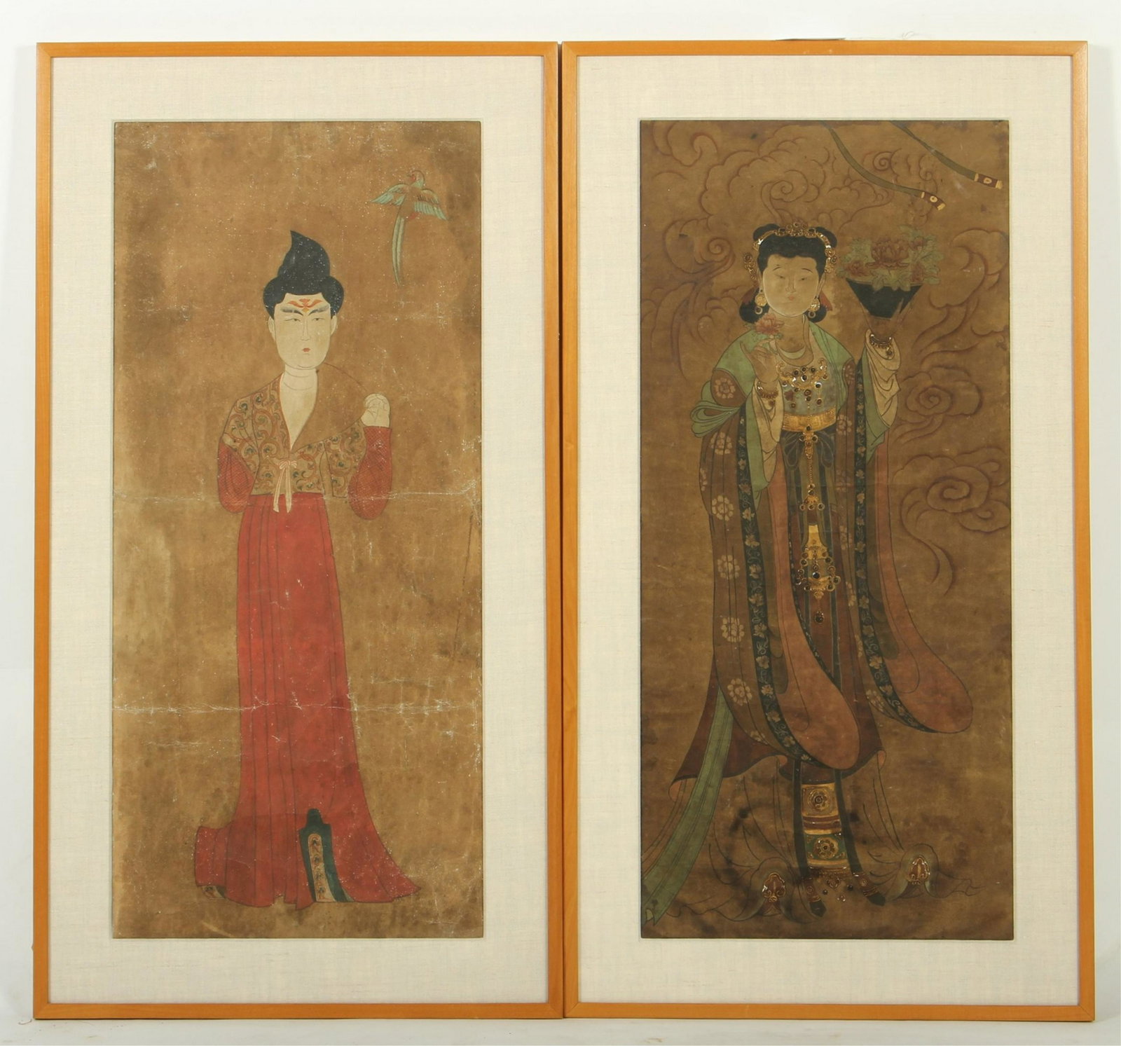 Two Paintings of Tibetan Woman, W/C On Silk: One with built up paint to create dimensional/raised jewelry. Both with same linen mats, cherry or maple framing- v. clean lines, fresh look. sight 33.25"H x 15.25 framed 39.75 x 21.5 Property from th