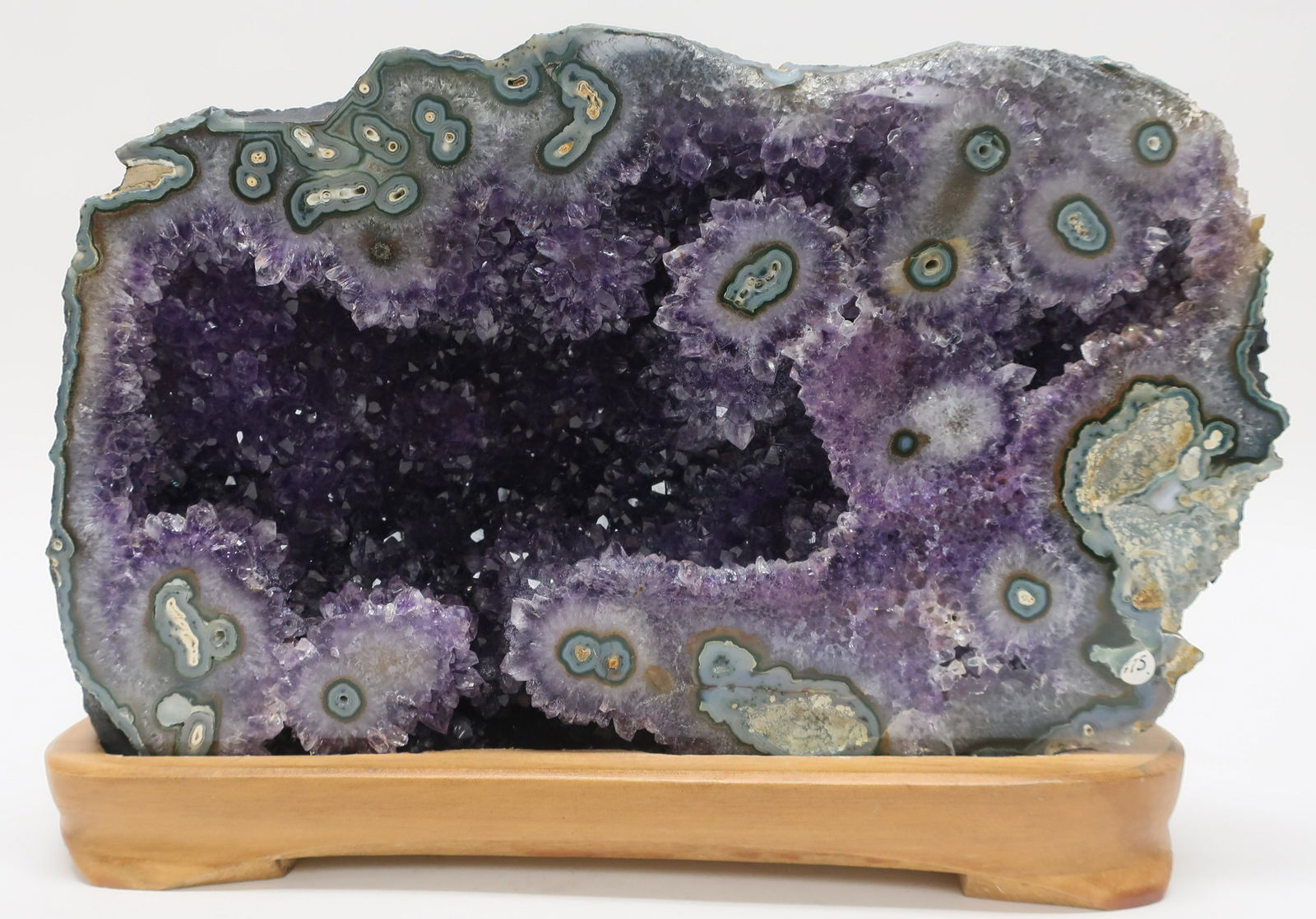 Amethyst Geode: 7"H x 11"W x 3"D Litchfield Auctions is honored to offer Selections from the Collection of Peter Tillou. Peter has enjoyed wide renown across the United States and Internationally over his seventy-yea