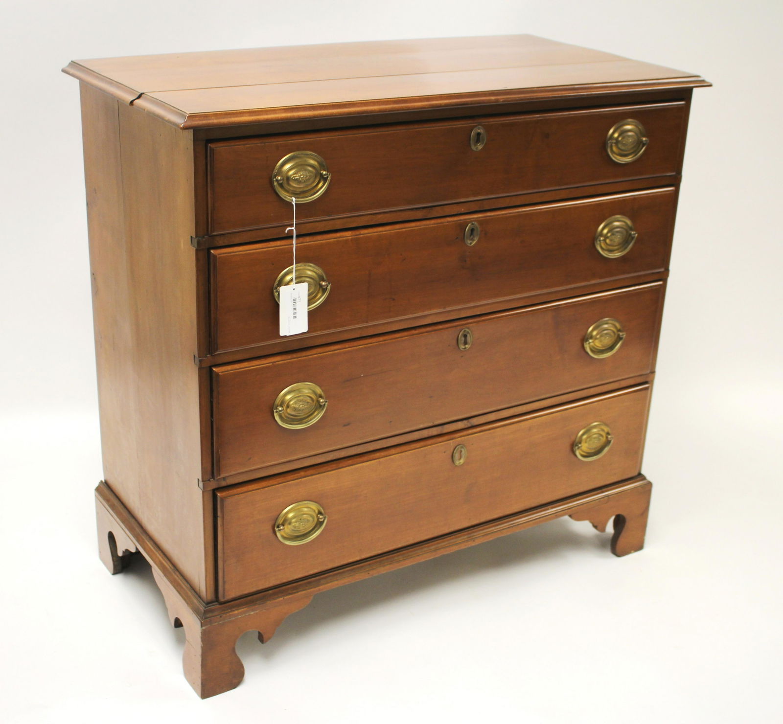 American Chippendale Cherry Chest of Drawers: 36 H x 37 W x 19 D Litchfield Auctions is honored to offer Selections from the Collection of Peter Tillou. Peter has enjoyed wide renown across the United States and Internationally over his seventy-y