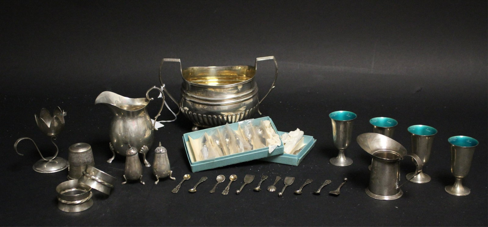 George III Silver Sugar Bowl, London 1810: R & S Hennell makers, gilt interior. Together with a group of small sterling silver items, bowl 10.5 ozt. and the weighable silver group 18.9 ozt. Total weight for the bowl and the group is 29.43 ozt.
