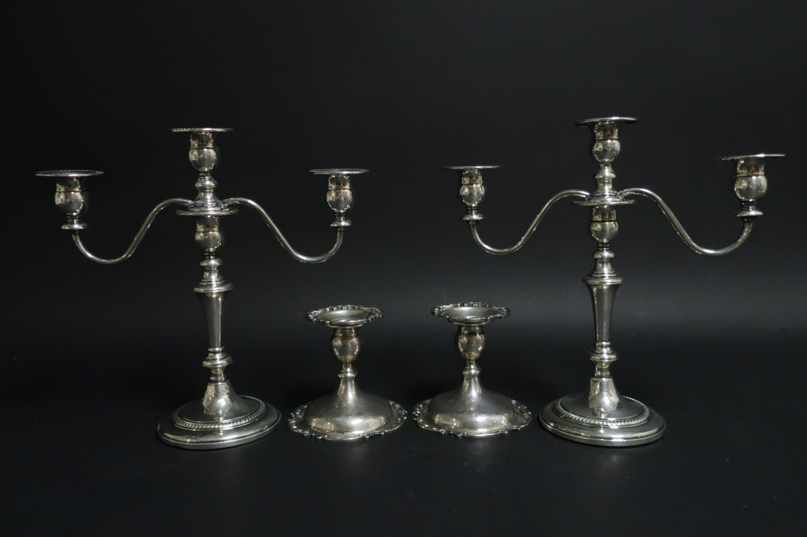 Sterling Silver Candelabra & Low Candlesticks: Candelabra are weighted. Candelsticks weigh 16.25 ozt 11 H x 11.5 W and 4.5 H x 4.5 diam (KZ590)(WT)