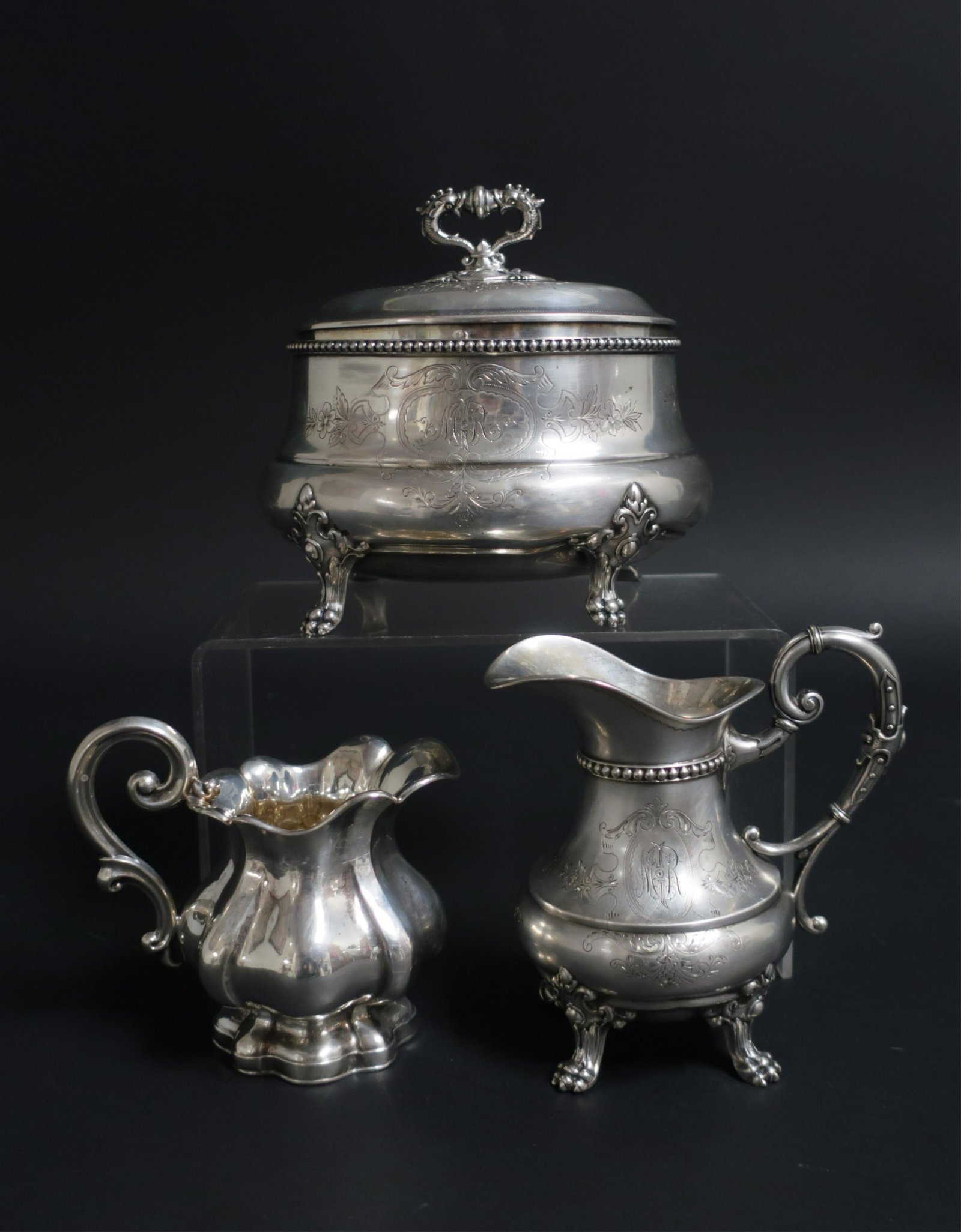 3 Silver Items: .800 silver etrog box and 2 creamers, box, and one creamer monogrammed,16 OZT. Box: 5.5 H x 5.5 L x 4.25 D Property from the Estate of Madeleine Deutscher, Sutton Place, NYC (MADD306/3)(WT)