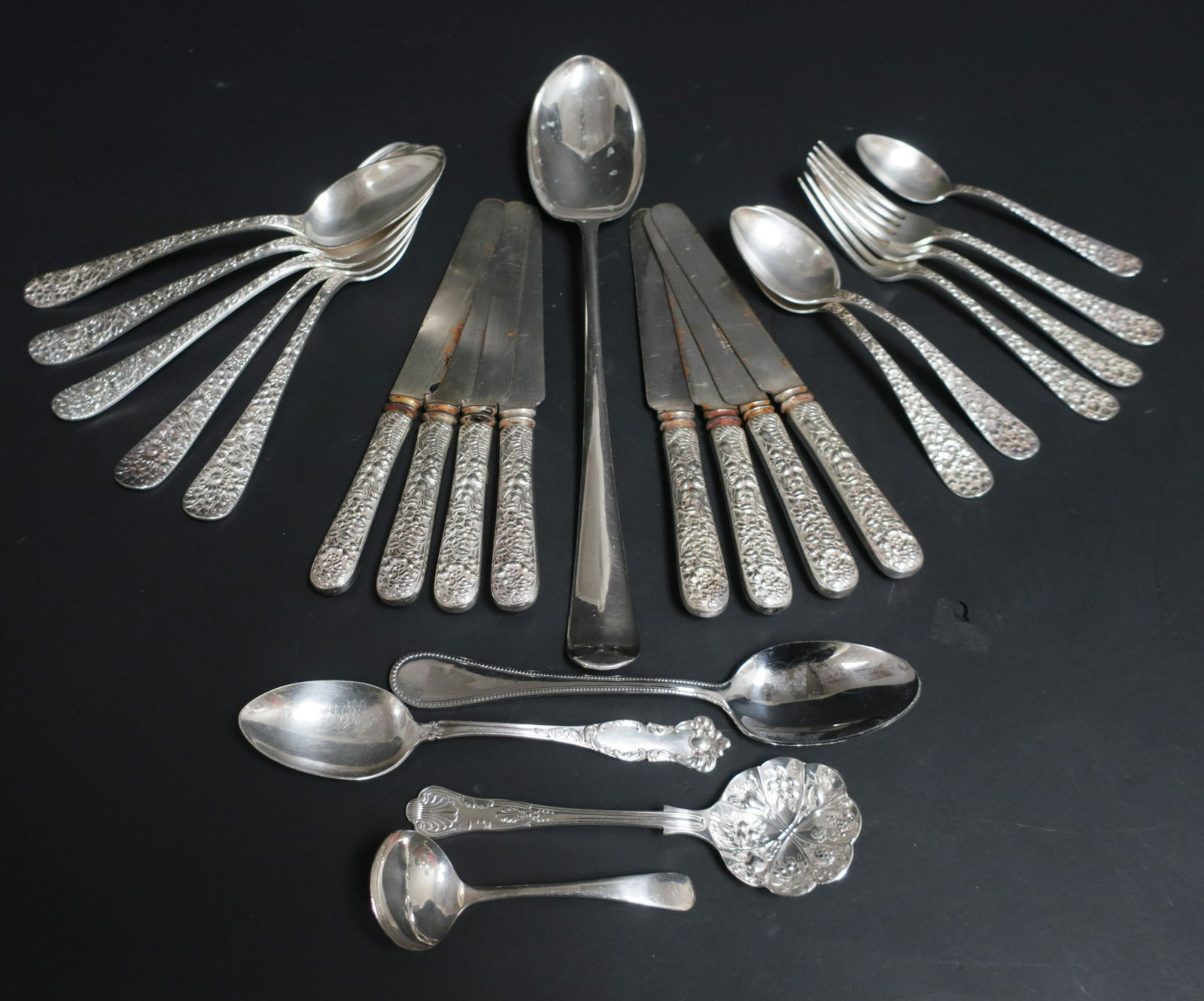 19 pcs of Tiffany and Co. Silverplate Flatware: 19 Pieces of Tiffany and Co. Silverplate Flatware in floral pattern along with a variety of silverplate serving spoons, makers include s.g england,wm.rogers, Sheffield and Christofle Various (DWYL1037