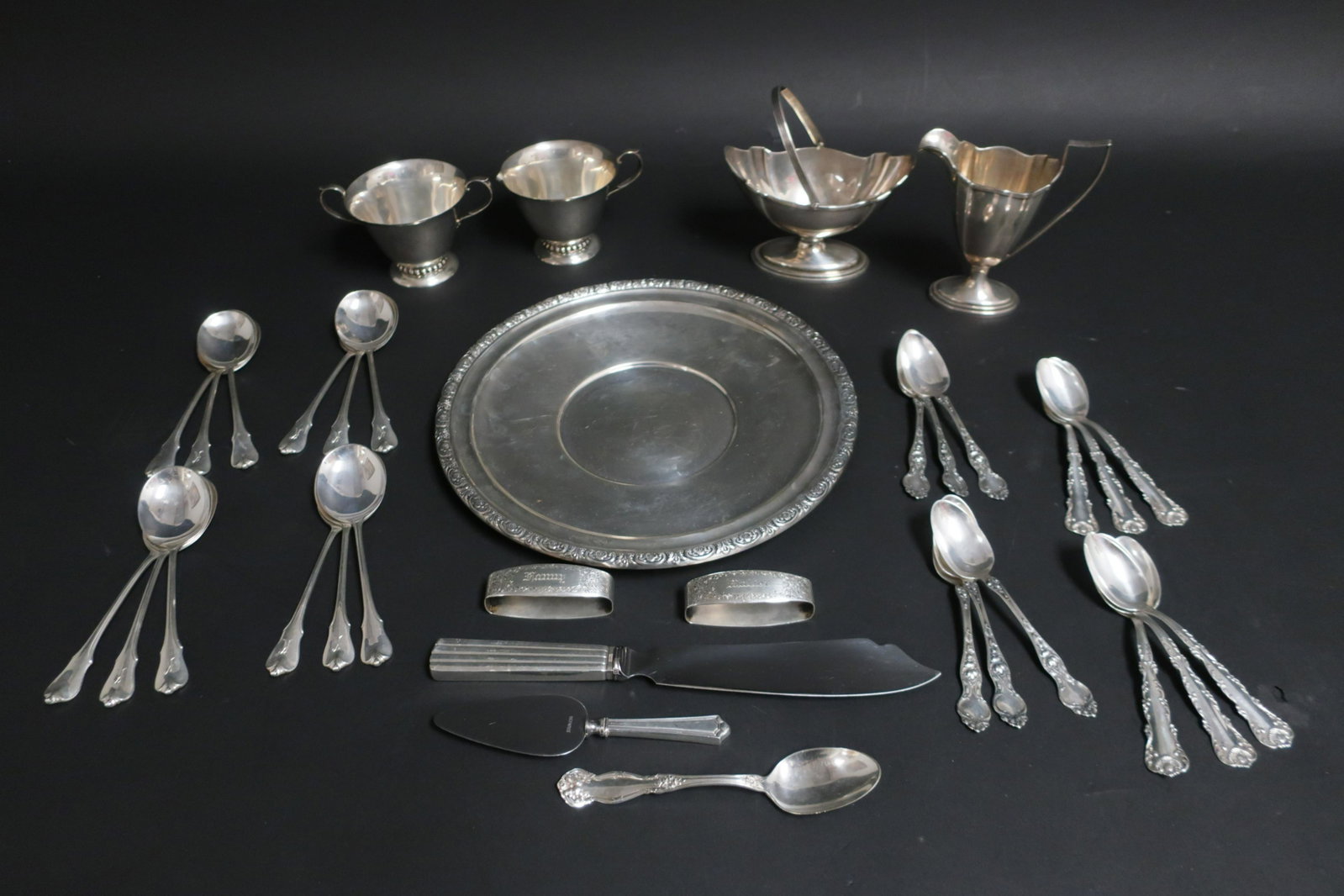Lot of Various Sterling Flatware & Hollowware: Georg Jensen cake knife with hollow handle, 12 soup spoons monogramed K by Wallace, 13 tea spoons in 3 patterns, cheese knife with hollow handle, 2 pairs of creamers and suges, one by Gorham, pair of 