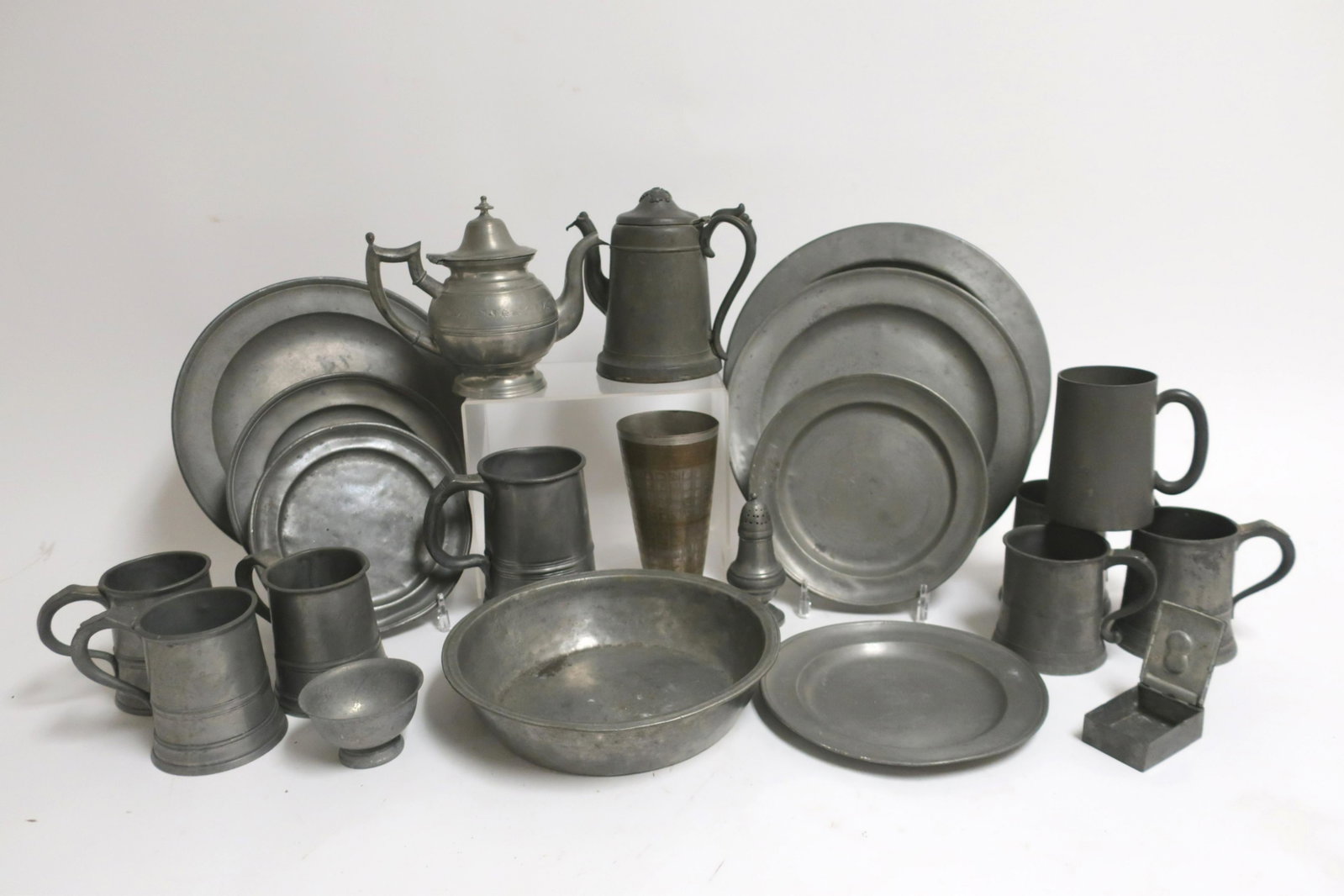Collection Antique Pewter: Pints, quart, platters,teapot, plates. Some with marks: L. Terry, James Mathews platters; E. Smith teapot; Yates & Birch and James Yates pints. pints 4"H E. Smith 7.5 platters 12,15 dia. plates 9 (BBR