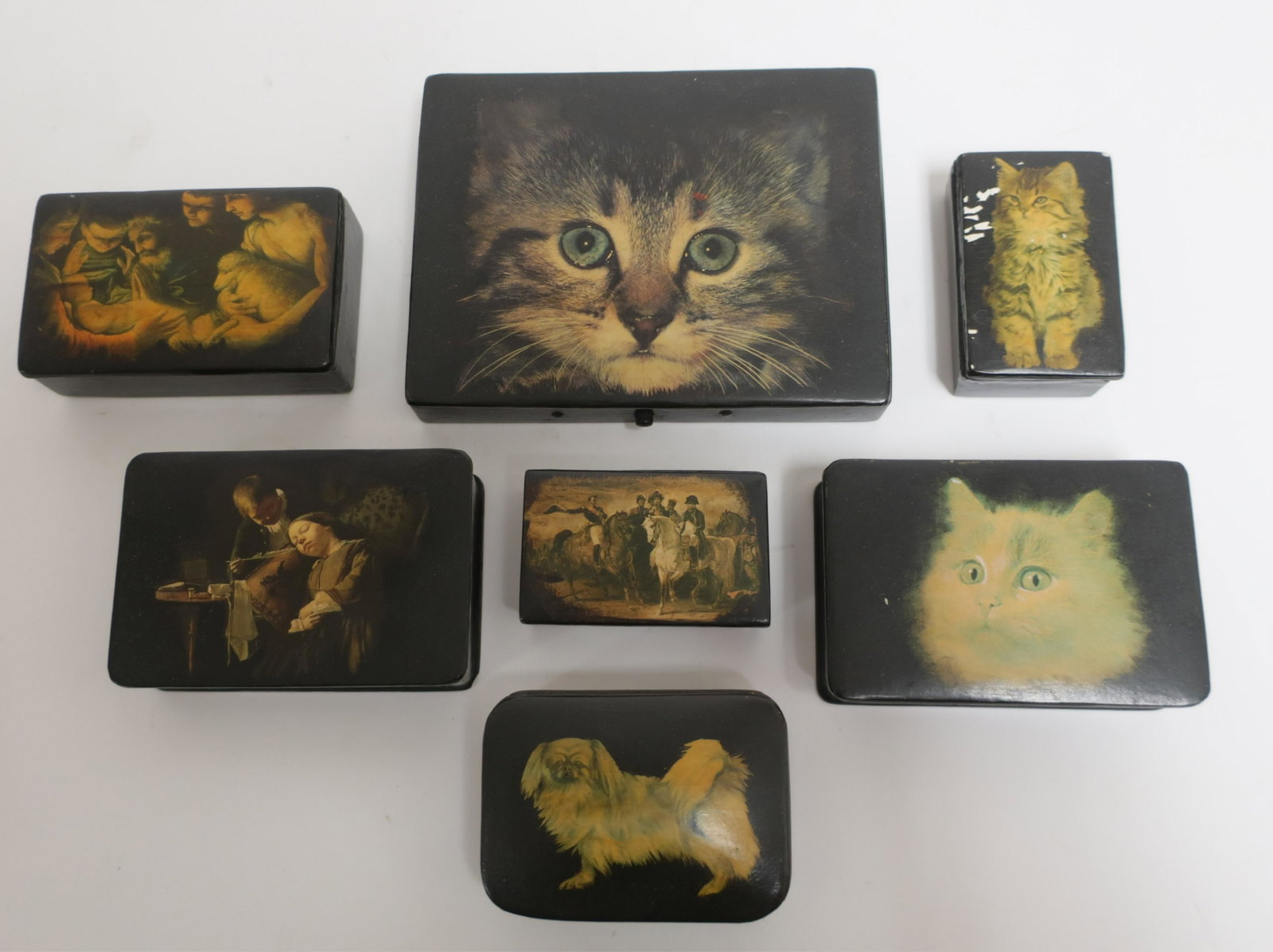 7 Papier Mache Small Boxes: Decorated with cats, dogs, and old master scenes. Smallest 2.5 x 1.75 Largest 5 x 4 (QLIV2151/7)(WT)