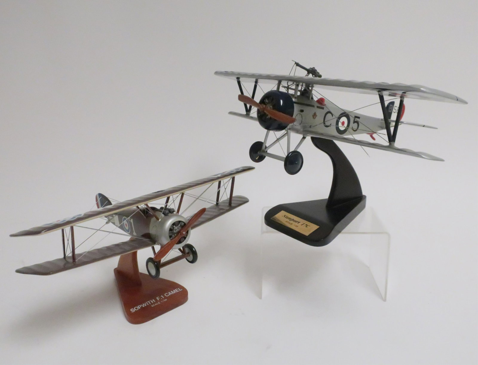 2 WW I Era Plane Models: Contemporary maker: Daron Worldwide Trading Inc. Sopwith F.1 Camel (1/24 scale); Nieuport 17 (1/20 scale). Both on stands. 9.5"H x 16 span & 8 x 14 (KHAY1011/2)(JP)