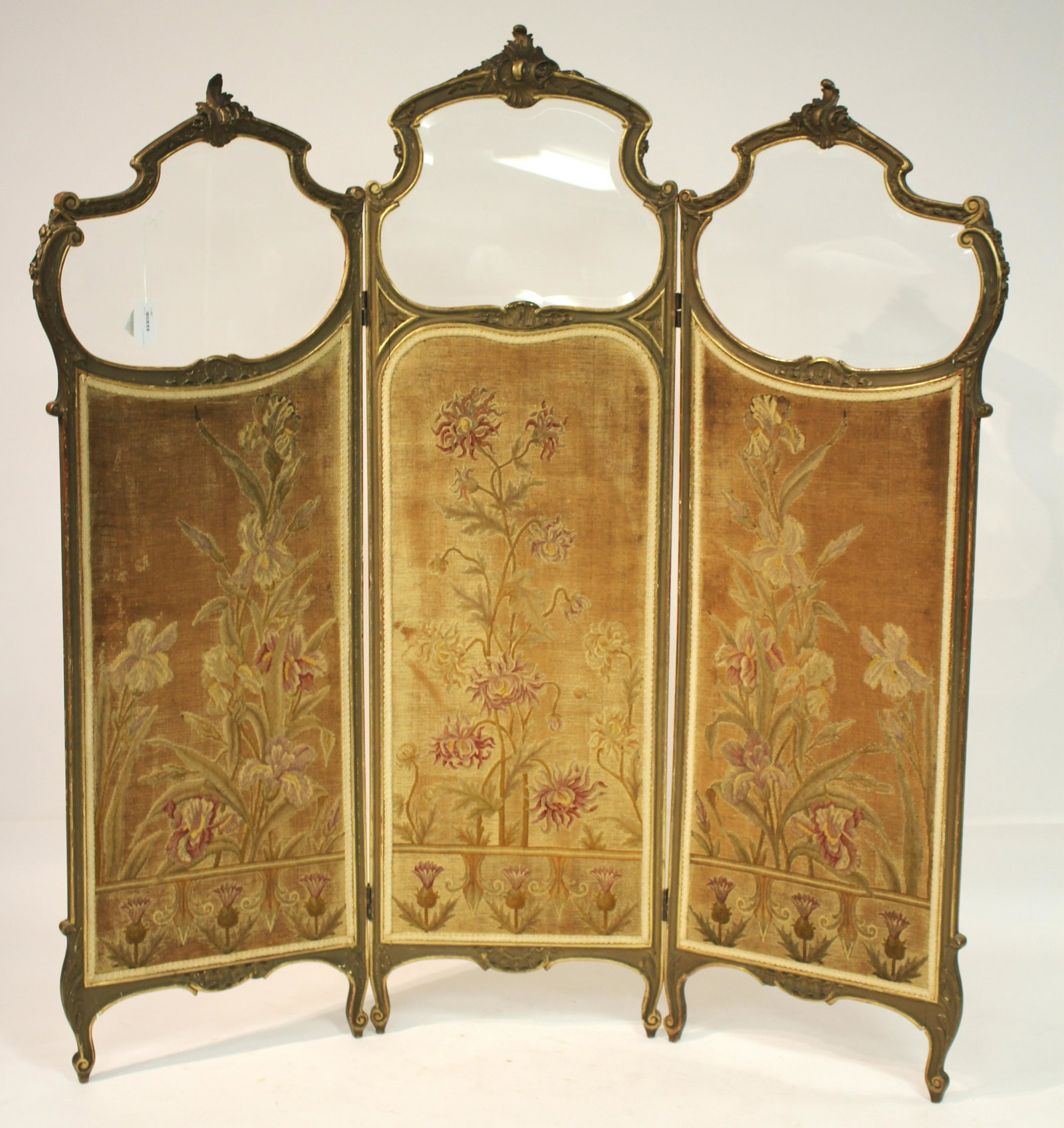 French Rococo Style Carved & Gilded Screen: 3 panel dressing screen, late 19th/early 20th C., beveled glass above needlework panels. 70 H x 67 W Property from the Estate of Madeleine Deutscher, Sutton Place, NYC (MADD507)(WT)
