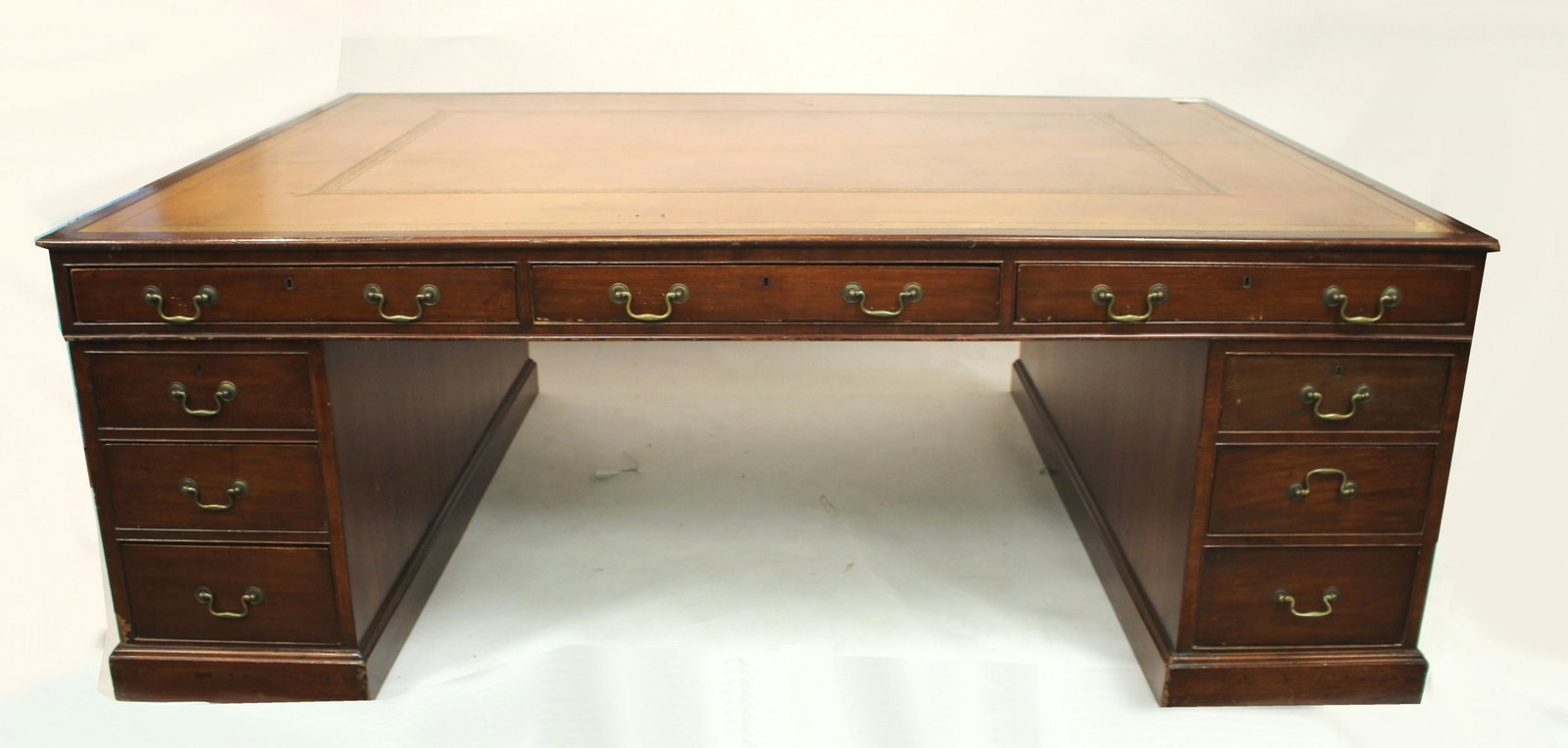 George III Style Mahogany Pedestal Partners Desk: 29.25 H x 80.5 W x 59 D Property from the collection of Martha Rogers & Dick Cavett (MROG937)(MS)
