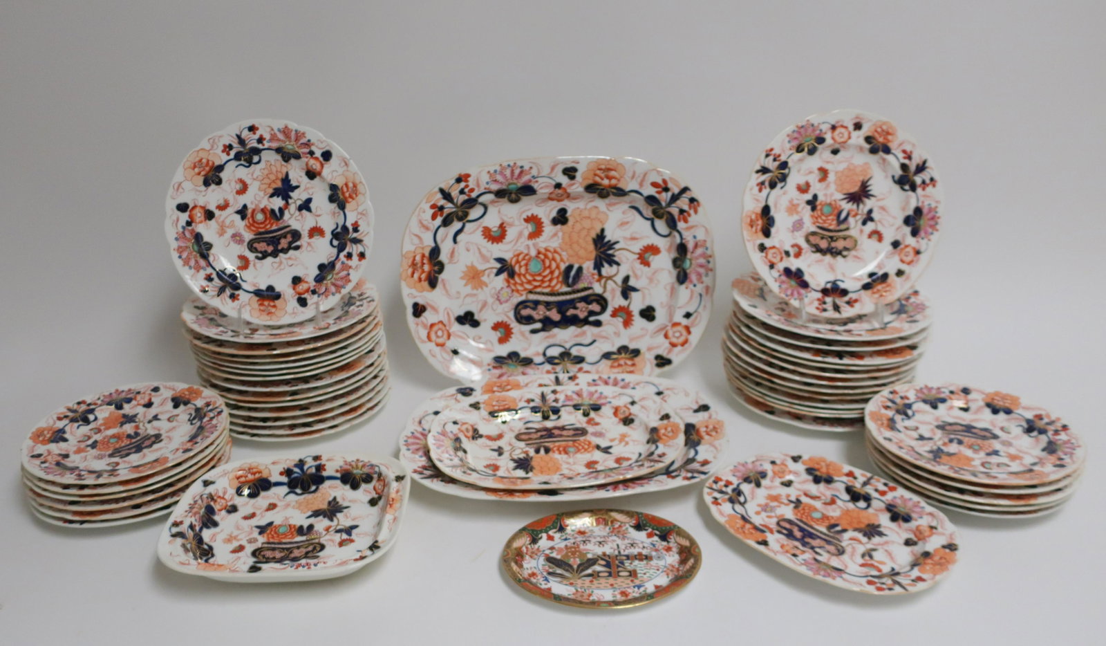 Imari Pattern Dinner, Lunch/Salad Plates, Platters: Mildly scalloped rims.(27) dinner, (11)salad/luncheon, (4)platters, square, shallow serving dish, an oval Spode 967 dish in the Imari style. 10" dinner salad/luncheon 9" graduated platters 15.5 x 11.5