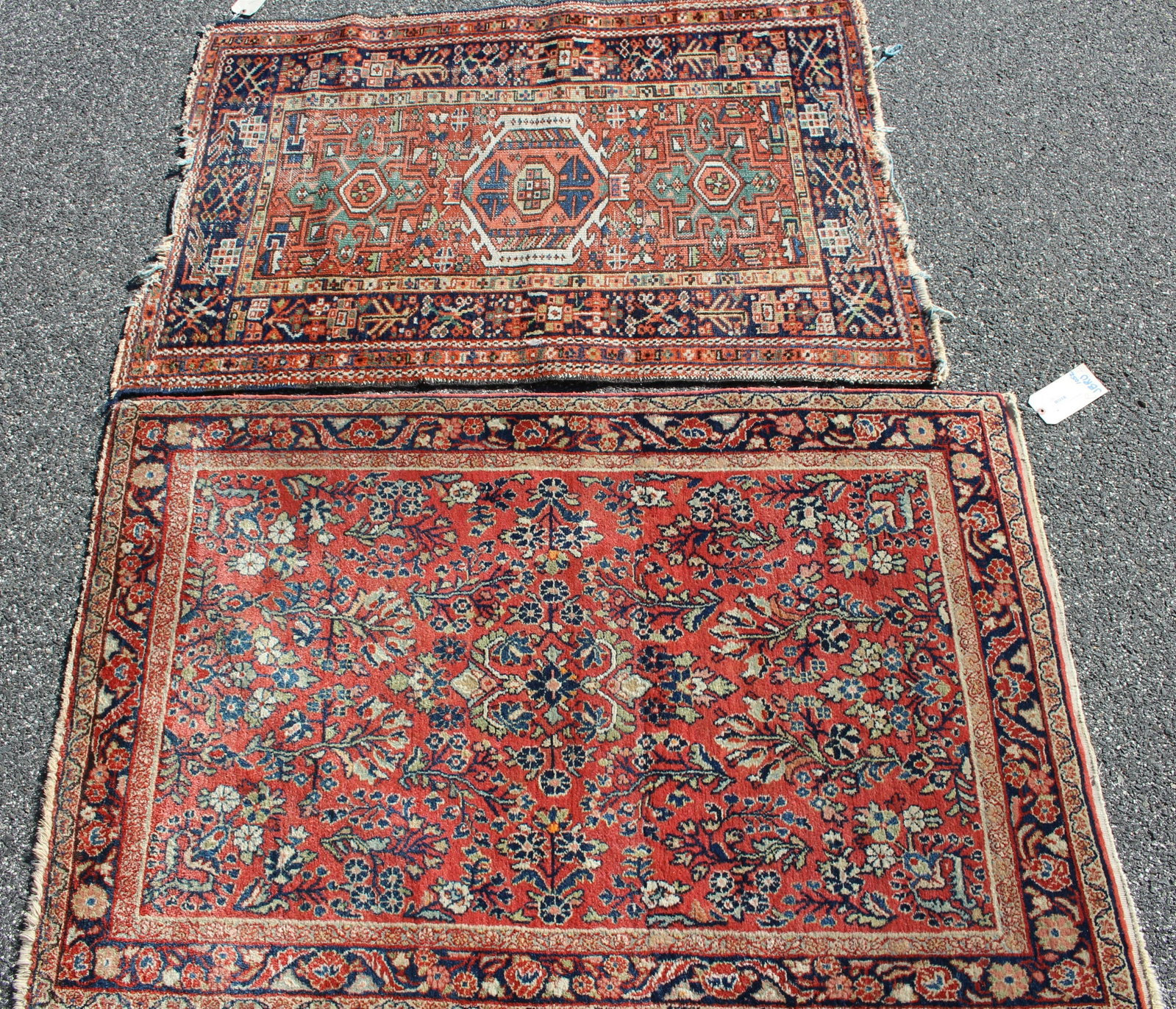 2 Hand Knotted Wool rugs, one Caucasian: 2 Two Hand Knotted Wool Rugs, one Caucasian, each of rust, blue and off white coloration 61 x 41, 54 x 38 (JBRU1052/2)(MM)