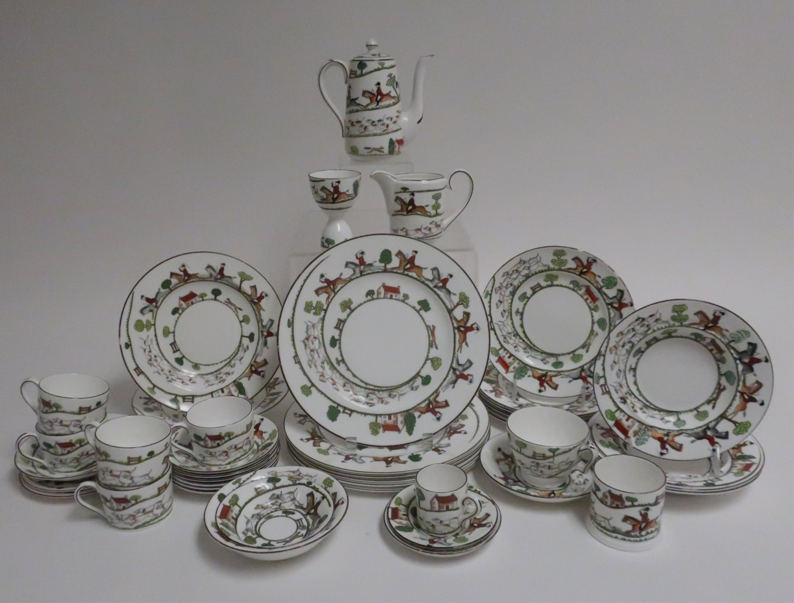 Assembled Partial Dinner Service: Hunting Scene pattern, Various manufacturers, Wedgewood, Coalport, and Staffordshire. 6 Dinner Plates (10.75 Diameter) 6 Lunch/Salad Plates (8/8.5 Diameter) 2 Soup Plates (9 Diameter) 4 Cereal/Soup Pl