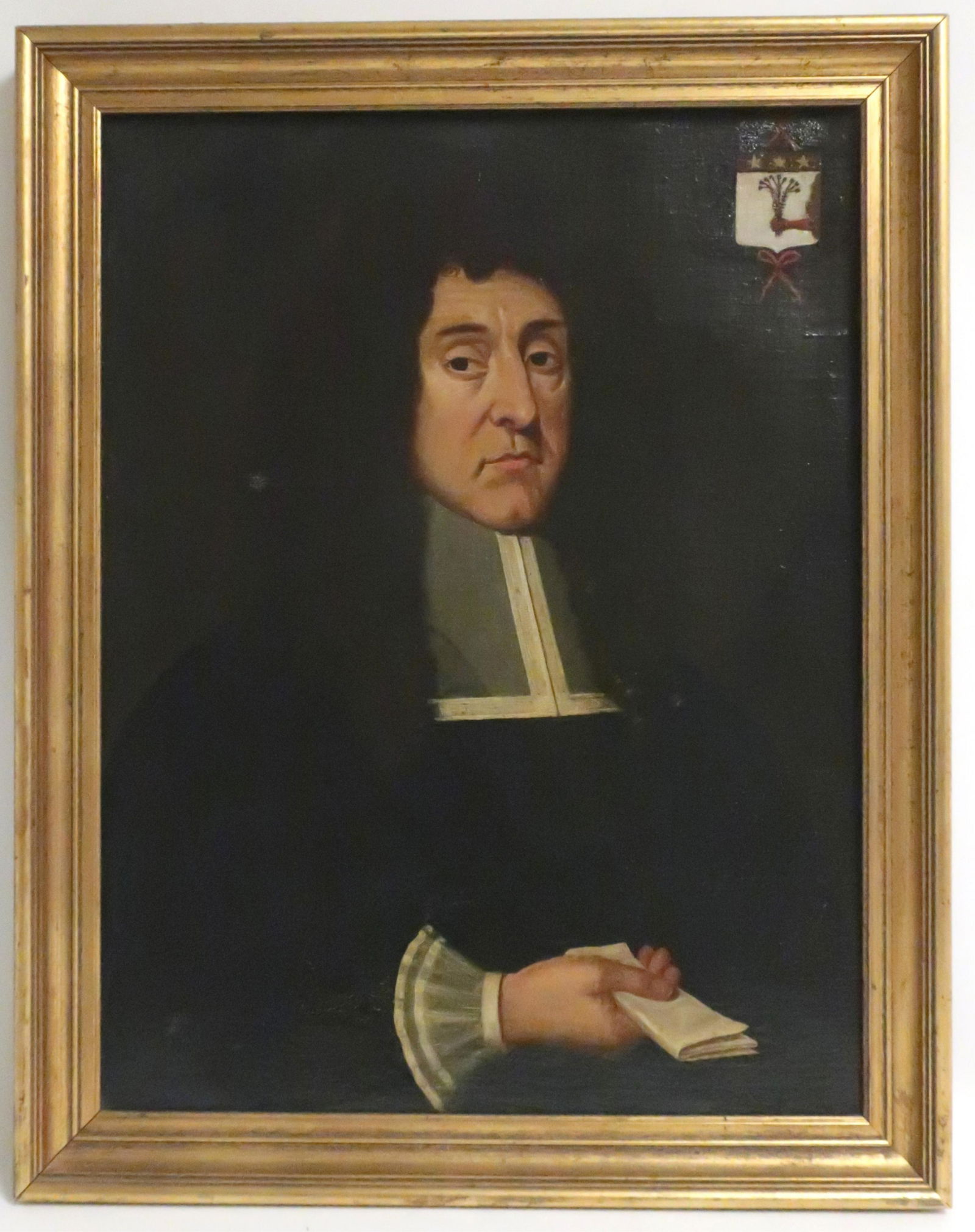 European School 17th c. Portrait of a Man, O/C: probably Northern European or British, unsigned, with a heraldric escutcheon upper right, an indecipherable text scratched into the bottom later stretcher 26x20, framed 29x23 (KHAY135)(TC)